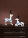 the-scintillating-reindeer-porcelain-table-showpieces-set-of-2-showpiece-932-1.jpg